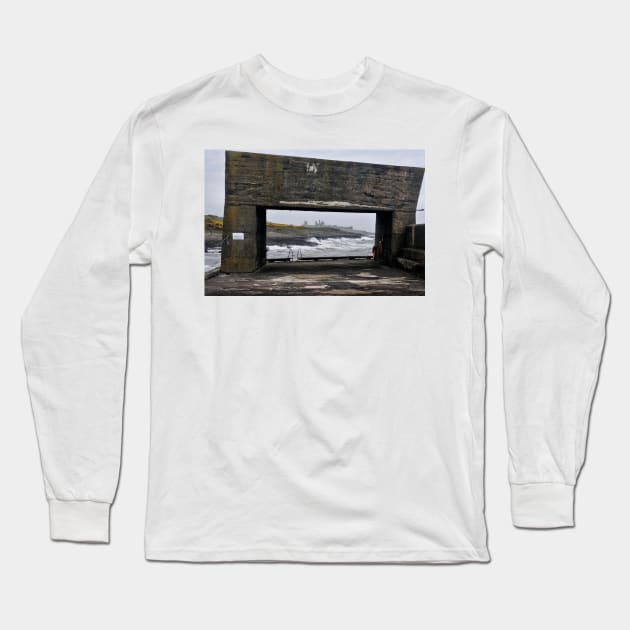 Craster Sea Wall View of Dunstanburgh Castle, Northumberland, UK Long Sleeve T-Shirt by richflintphoto